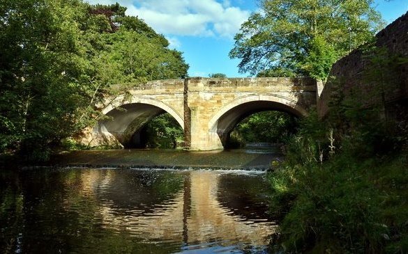Photograph from the downstream side of the bridge over the R. Leven near All Saints Parish Church